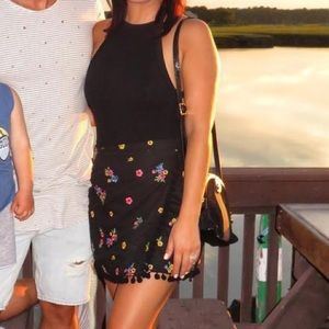 Crochet embellished wrap mini skirt with Pom trim